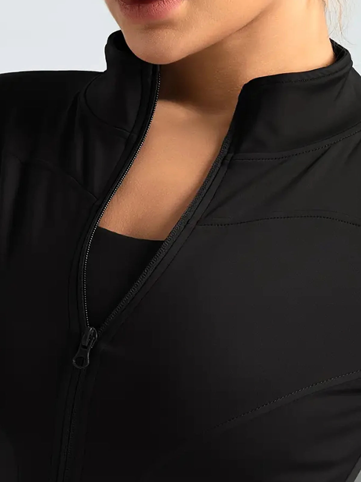 Chaqueta Deportiva de Cuello Alto con Protección Solar – imagen 9